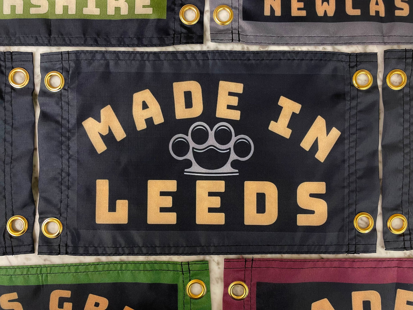 'MADE LEEDS - KNUCKLEDUSTER' Mini Flag Pennant