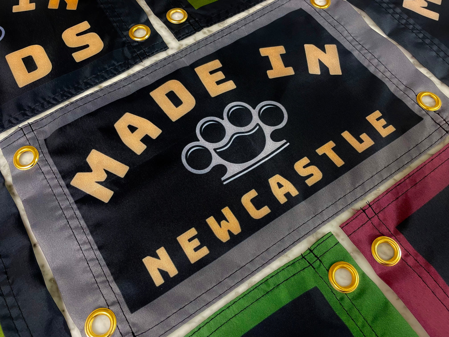 'MADE NEWCASTLE - KNUCKLEDUSTER' Mini Flag Pennant